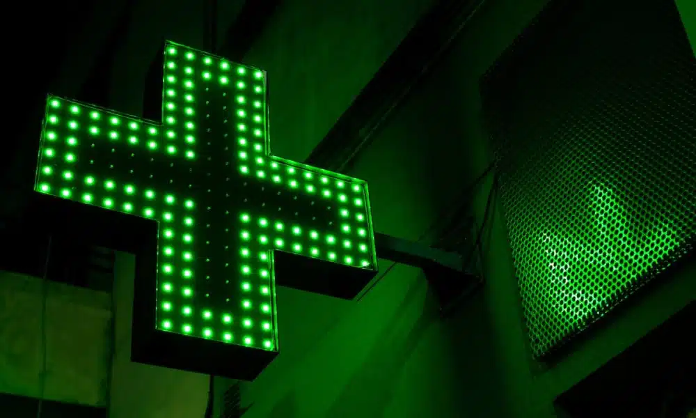 green and white x sign